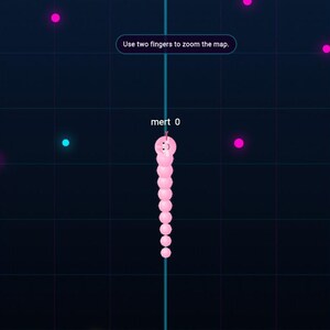 K&ouml;nnte beinhalten: Mobile Spieloberfl&auml;che mit dunkelblauem Hintergrund und Rastermuster. Ein rosa schlangenartiger Charakter befindet sich in der Mitte. Das Spiel zeigt einen Punktestand von 0 und einen Highscore von 1800 an. Verschiedene farbige Punkte und Steuertasten sind sichtbar.