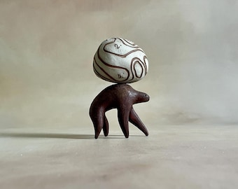 beast of burden  porcelain sculpture