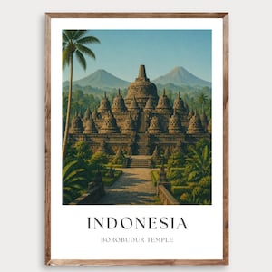Puede incluir: Una impresión enmarcada que presenta el templo de Borobudur en Indonesia. La imagen muestra el antiguo templo rodeado de exuberante vegetación y montañas bajo un cielo azul. Las palabras "INDONESIA" y "BOROBUDUR TEMPLE" están impresas en la parte inferior.
