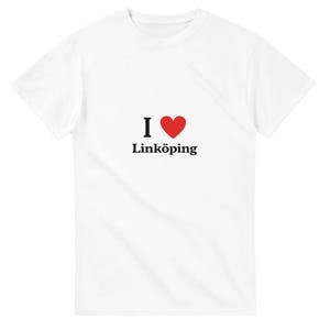 May include: White t-shirt with the text "I ♥ Linköping". The "I" is black, the heart is red, and the city name is in black. The shirt is made of a soft material.