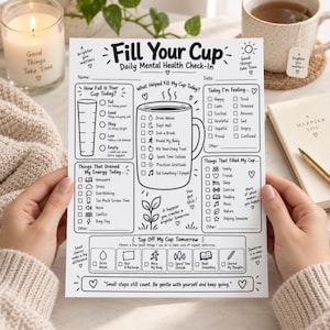 May include: A white paper sheet titled Fill Your Cup Daily Mental Health Check-In with black ink illustrations. It features sections for tracking daily feelings, energy levels, and habits, including a central mug graphic and checkboxes for daily activities.