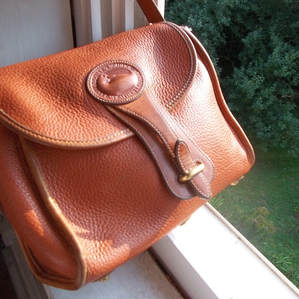 RESERVED FOR LOVELIGHTSTUDIO Dooney & Bourke All Weather Leather Vintage Handbag in Tan