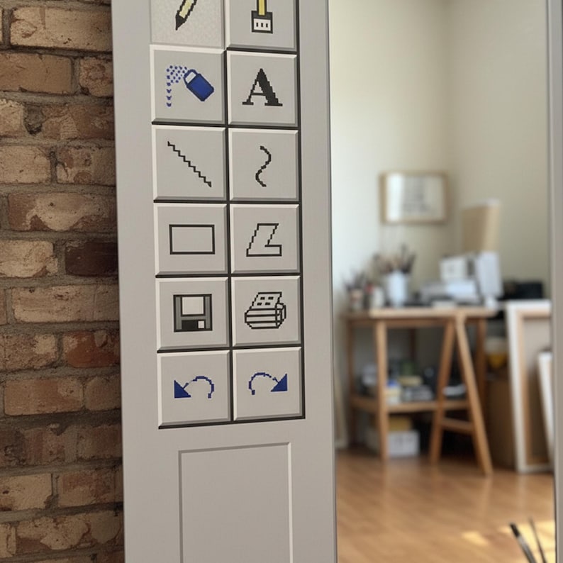May include: A white panel with a grid of square buttons, each displaying a pixelated icon. Icons include a pencil, paint brush, eraser, letter A, a zig-zag line, a curved line, a rectangle, a Z shape, a printer, and two curved arrows.