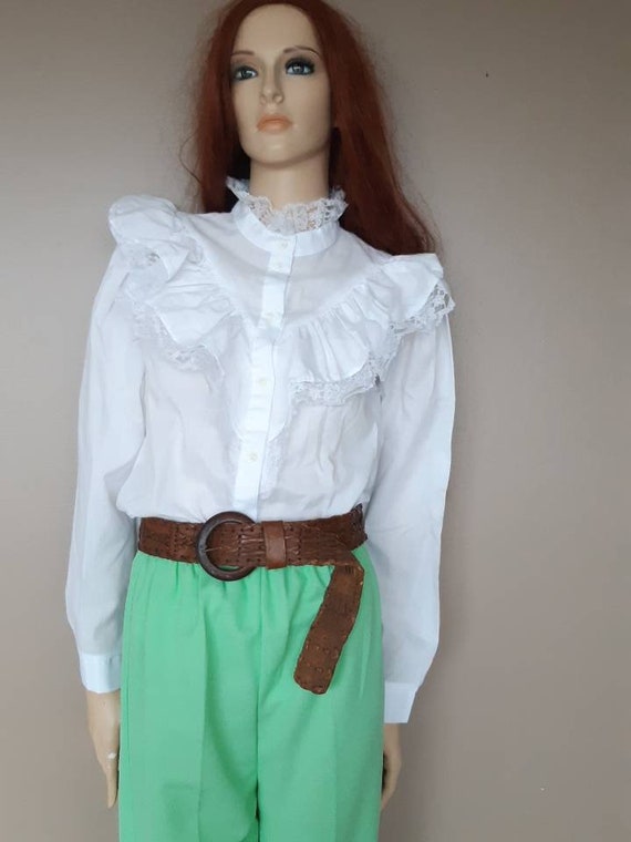 white ruffle blouse