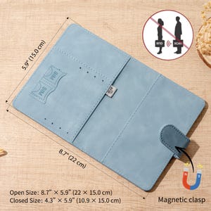 May include: A light blue passport holder with a magnetic clasp, featuring interior slots for SIM cards and cards. The open dimensions are 8.7 inches by 5.9 inches, and the closed dimensions are 4.3 inches by 5.9 inches. It includes RFID blocking technology.
