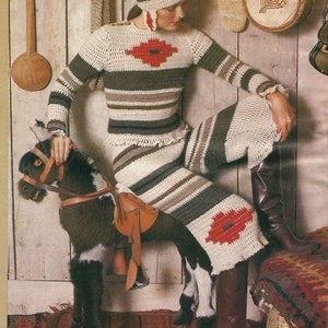 May include: A woman wearing a striped crochet dress and matching hat. The dress features a red flower design on the front. She is sitting on a rocking horse with a brown saddle. The background is a wooden wall with various decorations.