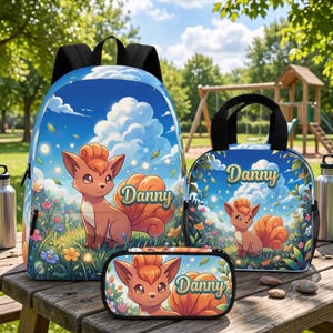 May include: A backpack, lunch bag, and pencil case set featuring a cartoon fox character in a field of flowers under a blue sky with clouds. Each item displays the name Danny in a stylized script font against the vibrant, colorful background.