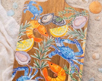 Tabla de cortar cangrejo azul y camarones
