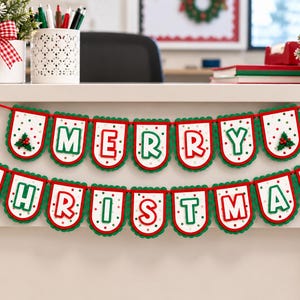 May include: A two-tiered felt banner spelling Merry Christmas in red and green letters on white scalloped pennants with red and green polka dots. Each pennant is outlined in red and green, strung on a red cord, and features holly accents.