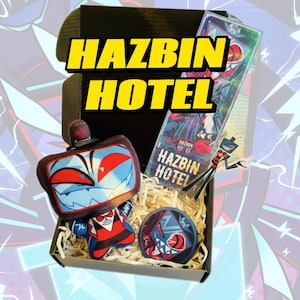 以下が含まれることがあります： Hazbin Hotelのグッズが入った黒い箱。箱の中にはぬいぐるみ、ブックマーク、ボタンが入っています。ぬいぐるみはテレビの頭をしたキャラクターです。ブックマークとボタンにはHazbin Hotelのロゴとキャラクターが描かれています。