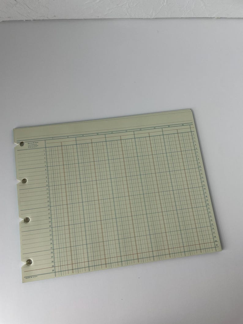 May include: A vintage ledger sheet with a grid pattern, featuring rows and columns for data entry. The sheet has a light green hue with brown and blue grid lines. It has three hole punches on the left side and is made in the U.S.A.