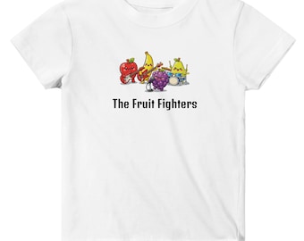 May include: White t-shirt featuring a cartoon band of fruits: an apple, banana, pear, and grapes. The apple plays guitar, the banana plays guitar, the pear plays drums, and the grapes are a microphone. The text "The Fruit Fighters" is below the band.