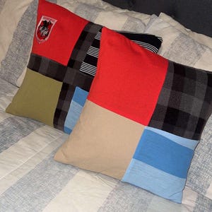 May include: A set of three ceramic mugs with a speckled, matte finish. The mugs are in shades of cream, light gray, and dark gray. Each mug has a simple, minimalist design, perfect for coffee or tea.