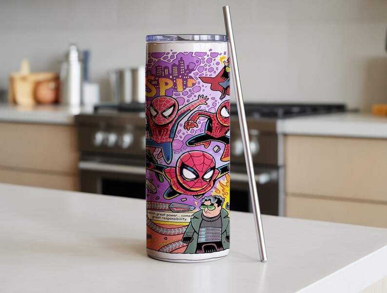 May include: A stainless steel tumbler with a comic book design, showcasing Spider-Man in red, blue, and black on a purple backdrop. The tumbler has a silver straw and the text "Spider-Man".