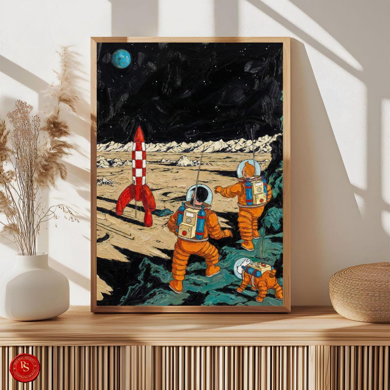 May include: A framed art print depicting a retro space scene. The artwork features three astronauts in orange suits exploring a lunar landscape with a red and white rocket. The background shows a starry night sky and a blue planet.