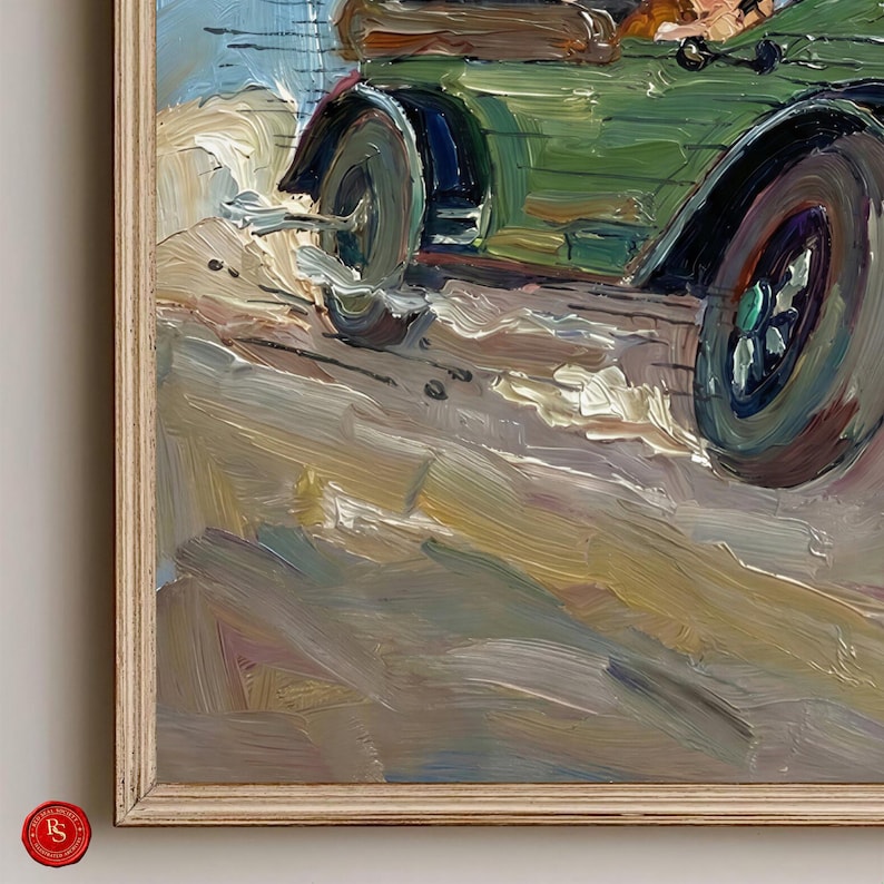May include: Oil painting of a vintage green car with black fenders and wheels. The artwork is framed in a light-colored wooden frame. The painting depicts the car on a sandy or dirt road, with a blue sky in the background.