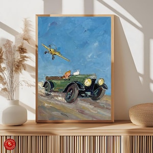 May include: A framed painting depicts a vintage green car with a person and a white dog, and a yellow airplane in a blue sky. The artwork has a textured, painterly style, with visible brushstrokes. The scene evokes a sense of adventure and classic illustration.