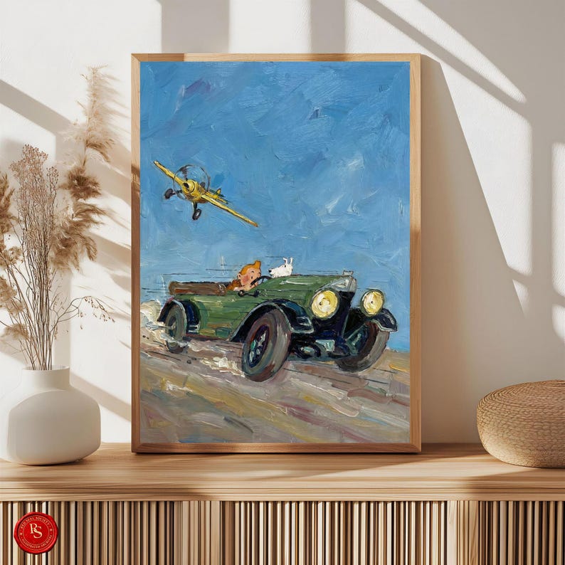 May include: A framed painting depicts a vintage green car with a person and a white dog, and a yellow airplane in a blue sky. The artwork has a textured, painterly style, with visible brushstrokes. The scene evokes a sense of adventure and classic illustration.
