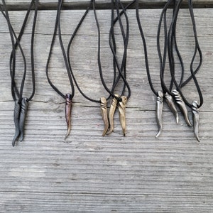 Steel Dragon Tooth Pendant