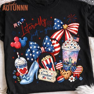 May include: Black t-shirt with a patriotic design featuring a bow, Mickey Mouse ears, and a high heel. The shirt includes the text "Literally just a girl" and other American-themed graphics like fireworks and the Statue of Liberty.