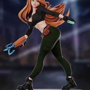 May include: A figurine of a female character with long red hair, wearing a black crop top, green pants, and black boots. She holds a blue and orange weapon and a small teal device. The figure is on a dark base.