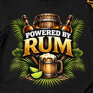 May include: A black t-shirt featuring a graphic design of a wooden barrel, two glass bottles, and a wooden mug filled with a frothy beverage. The text reads POWERED BY RUM in bold gold letters, surrounded by green palm leaves and lime wedges.