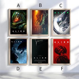 May include: Six framed movie posters featuring the word "ALIEN" and "ROMULUS". The posters have various images of the alien creature in different scenes. The posters are in wooden frames and are displayed on a white wall.