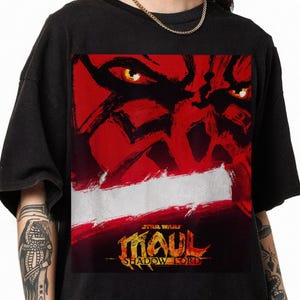 May include: A set of three ceramic mugs with a speckled, matte finish. The mugs are in shades of cream, light brown, and dark brown. Each mug has a simple, minimalist design and a rounded handle.