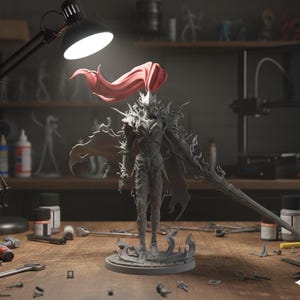 May include: A detailed gray figurine of a warrior with a flowing red cape and a large sword, standing on a circular base. The figurine is on a wooden workbench with tools and paint bottles, illuminated by a desk lamp.