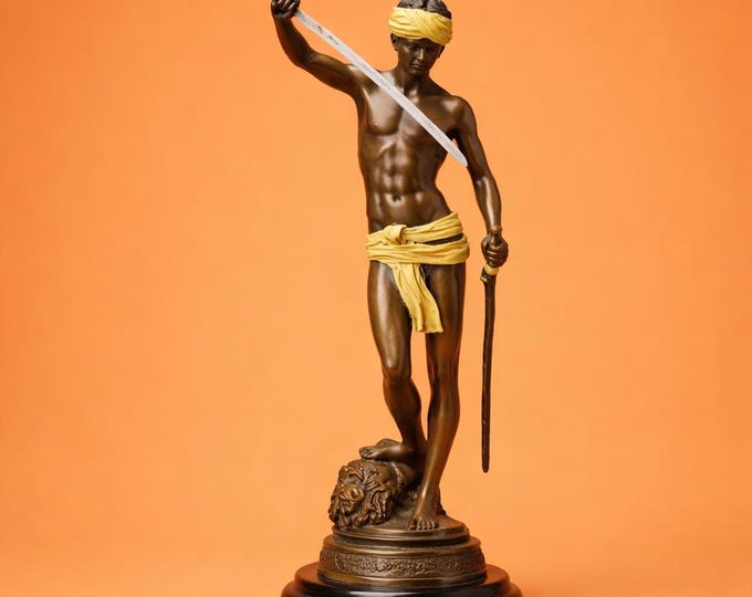A Bronze Sculpture of Davids Victory Over Goliath 33cm