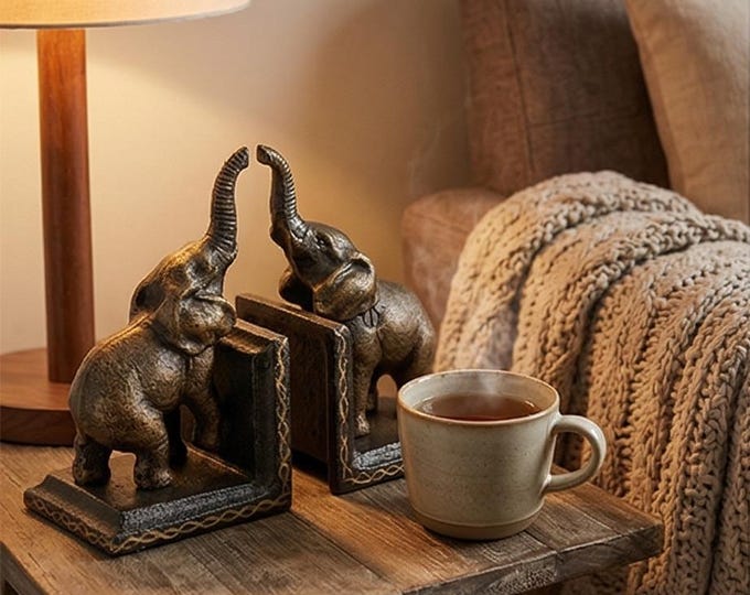 A Pair Of Cast Iron Elephant Bookends 15cm