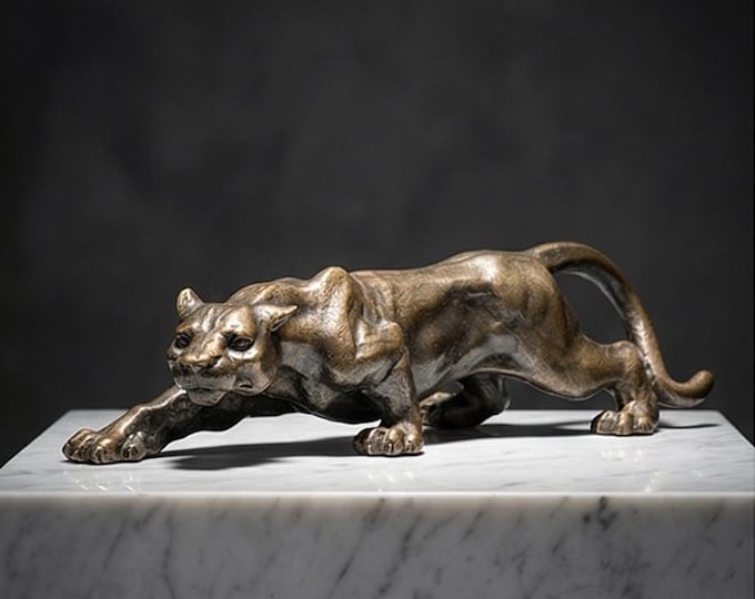A Cast Iron Sculpture Of A Panther 41cm