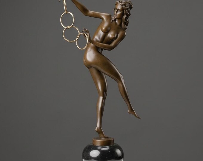 A Bronze Sculpture Called The Magic Rings 53 cm