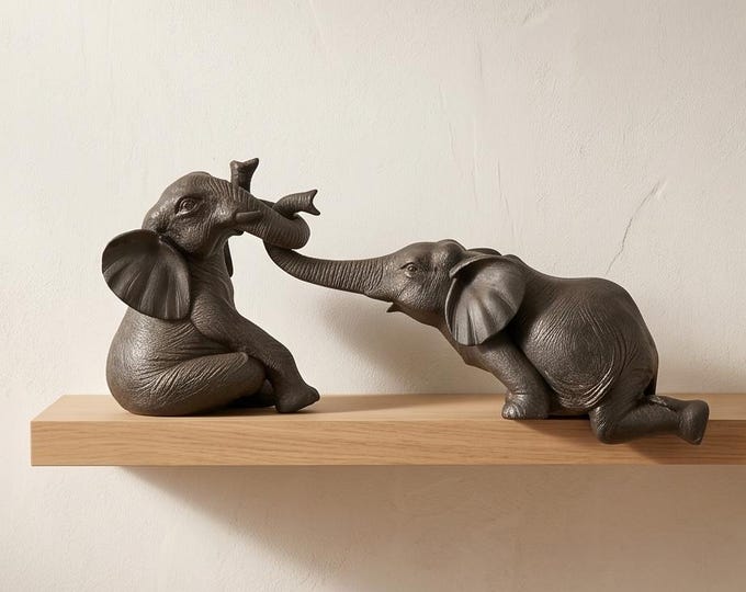 A Resin Figurine Of 2 Elephants 51 cm
