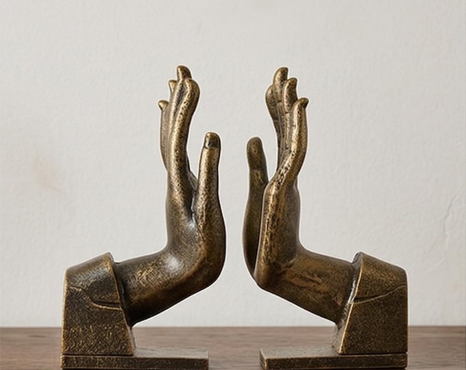 A Pair Of Cast Iron Hand Shaped Bookends 23cm
