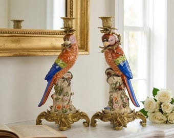 A Pair Of Brass Mounted Porcelain Parrot Candle Holders 36cm