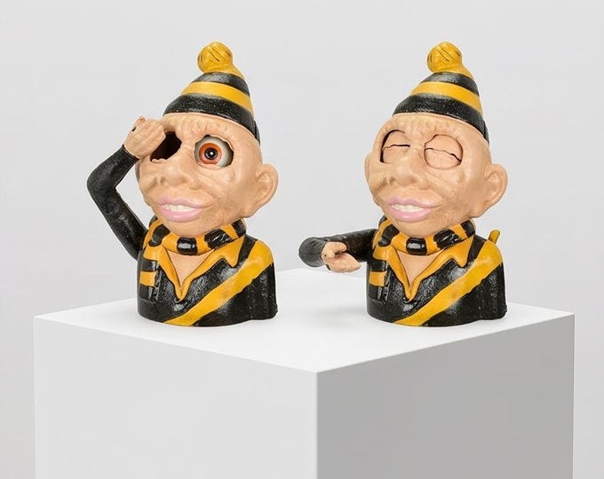 A Cast Iron Football Supporter Mechanical Bank 19 cm