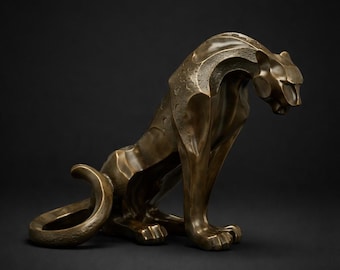 A Modernist Bronze Sculpture Of A Seated Jaguar 29cm