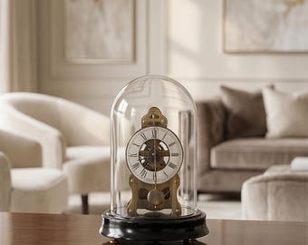 A Mechanical Table Clock Under Glass Dome 19 cm High