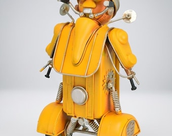 A Retro Tin Model Of A Robot Designed As A Scooter Rider - 21 cm - Yellow