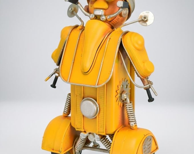 A Retro Tin Model Of A Robot Designed As A Scooter Rider - 21 cm - Yellow