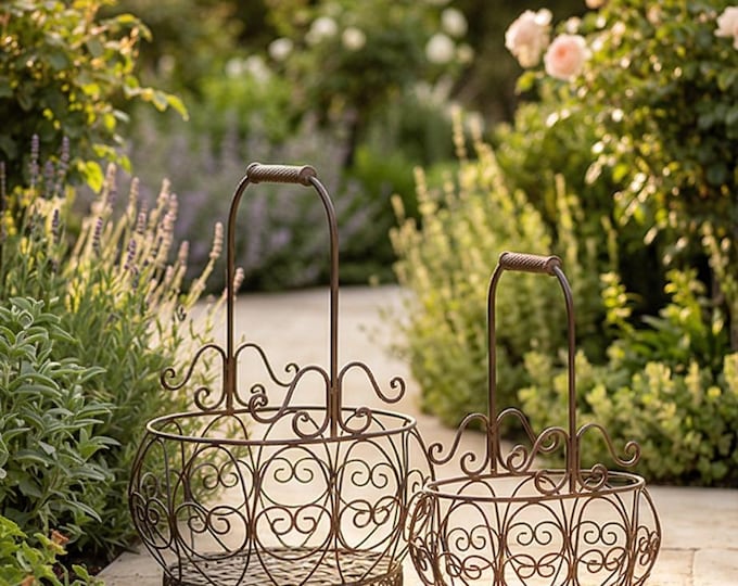 A Pair Of Wrought Iron Vintage Oval Baskets 49cm
