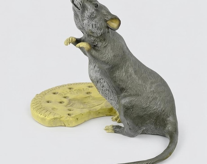A Bronze Sculpture Of A Mouse With Biscuit 12x16 cm