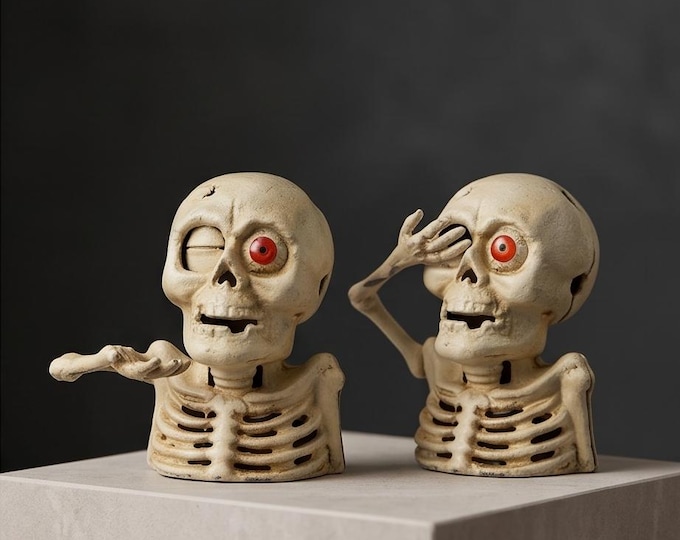 A Cast Iron Skeleton Mechanical Bank 17 cm