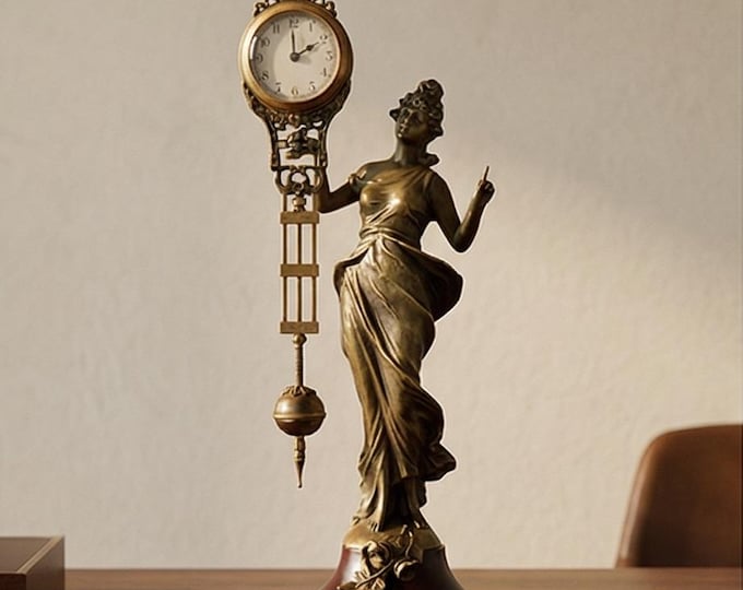 A Table Clock Mysterious Helt By A Dressed Woman, 33cm High