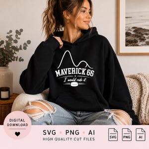 May include: A black hooded sweatshirt featuring a white graphic design of a roller coaster silhouette above the text MAVERICK 66 and the phrase I would ride it, with a hockey puck icon centred below the text on the front of the garment.