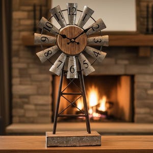 May include: A rustic windmill clock with a wooden center and metal blades displaying the numbers. The clock sits on a metal and wood base with a dark metal frame. The background features a fireplace.