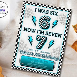May include: A rectangular birthday invitation card featuring a black and white checkered border. The text reads I WAS SIX NOW I'M SEVEN, with large numbers 6 and 7 in a checkered pattern, blue lightning bolts, and checkered flags.