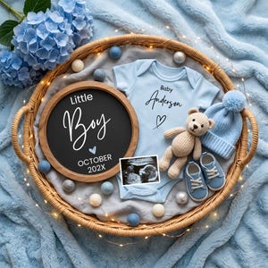 May include: A light blue baby bodysuit with the text Baby Anderson and a heart, a round wooden sign reading Little Boy OCTOBER 202X, a sonogram, a beige knit teddy bear, a light blue knit hat, and light blue baby shoes in a woven basket.