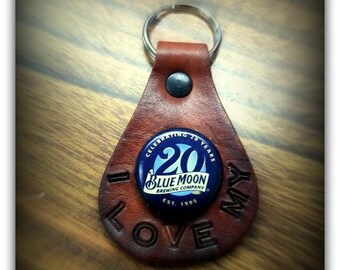 Honor your Favorite Beer, Pop, or Beverage with the cap fastened to a leather key Fob, with a 1" nickle plated split key ring
